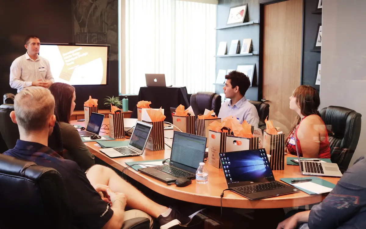 Off-Page SEO Services 2 Marketing team planning a link building outreach campaign on laptops in a meeting room