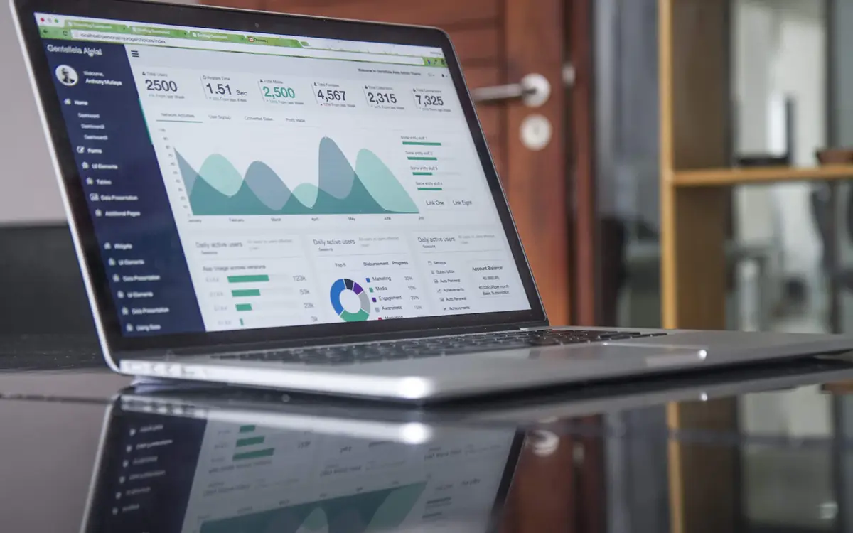 Laptop showing SEO analytics charts used to plan SEO services